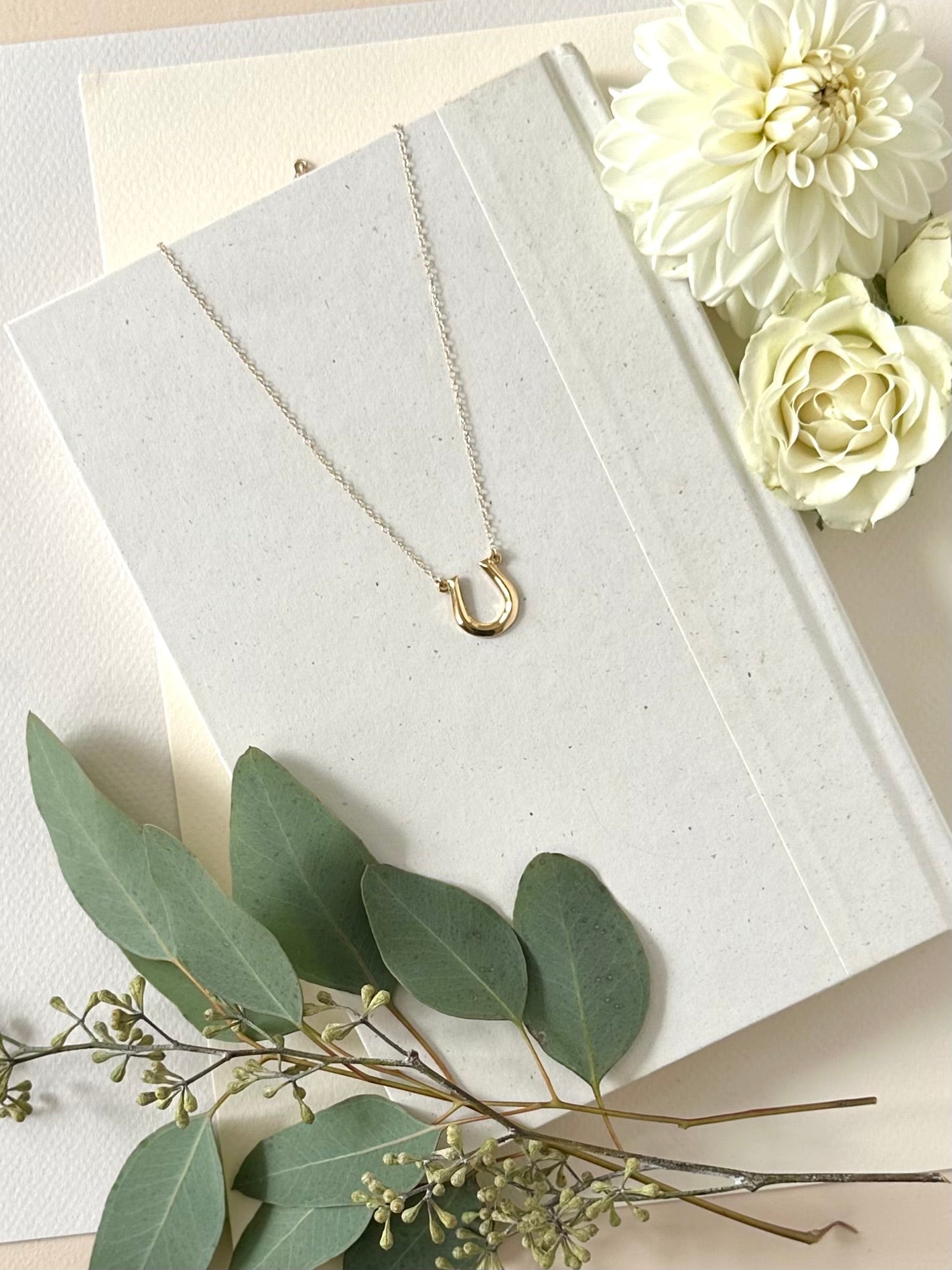 GOLD GEO HORSESHOE NECKLACE - Sarah Cecelia Jewelry & Metal Goods