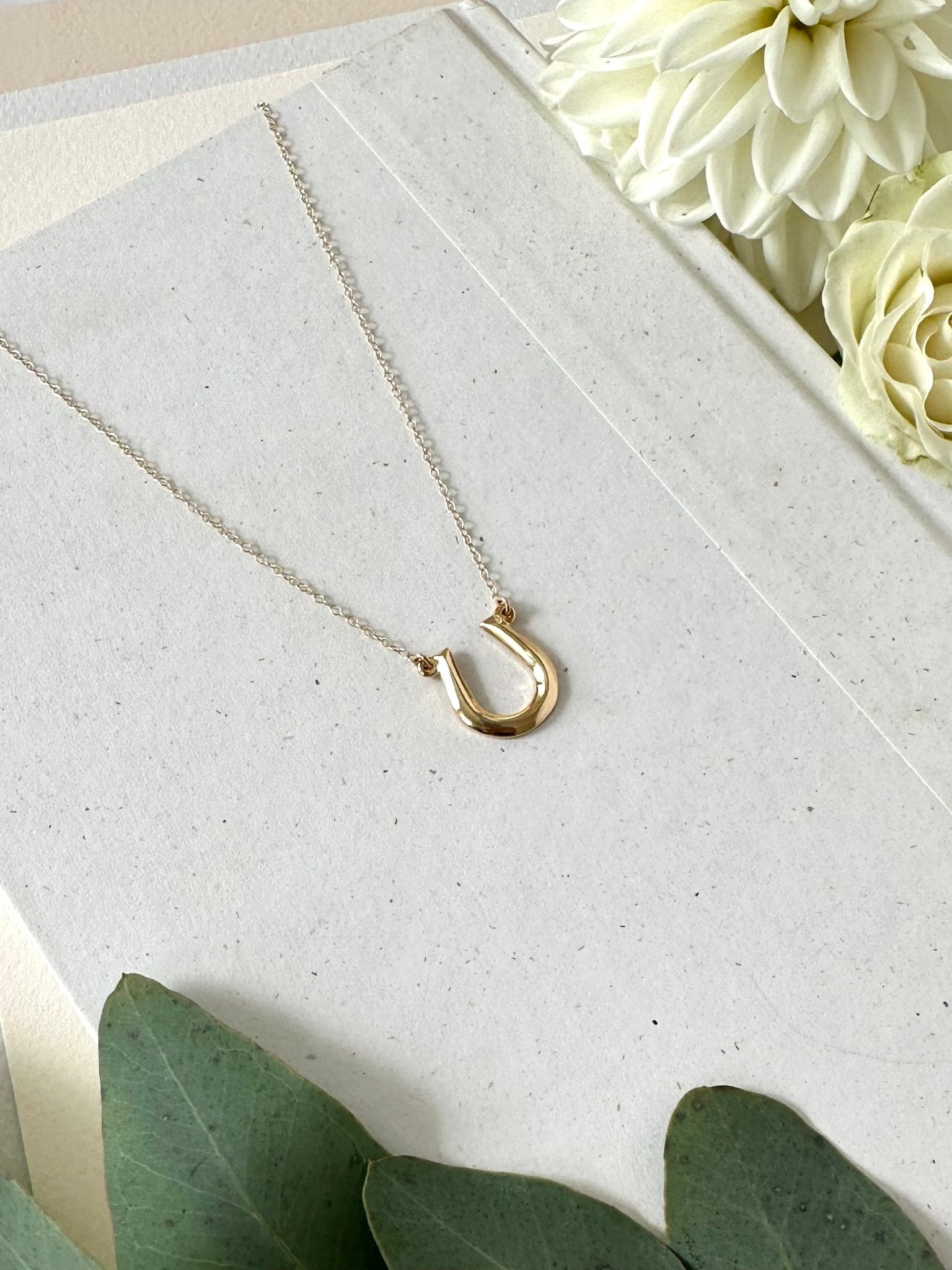 GOLD GEO HORSESHOE NECKLACE - Sarah Cecelia Jewelry & Metal Goods