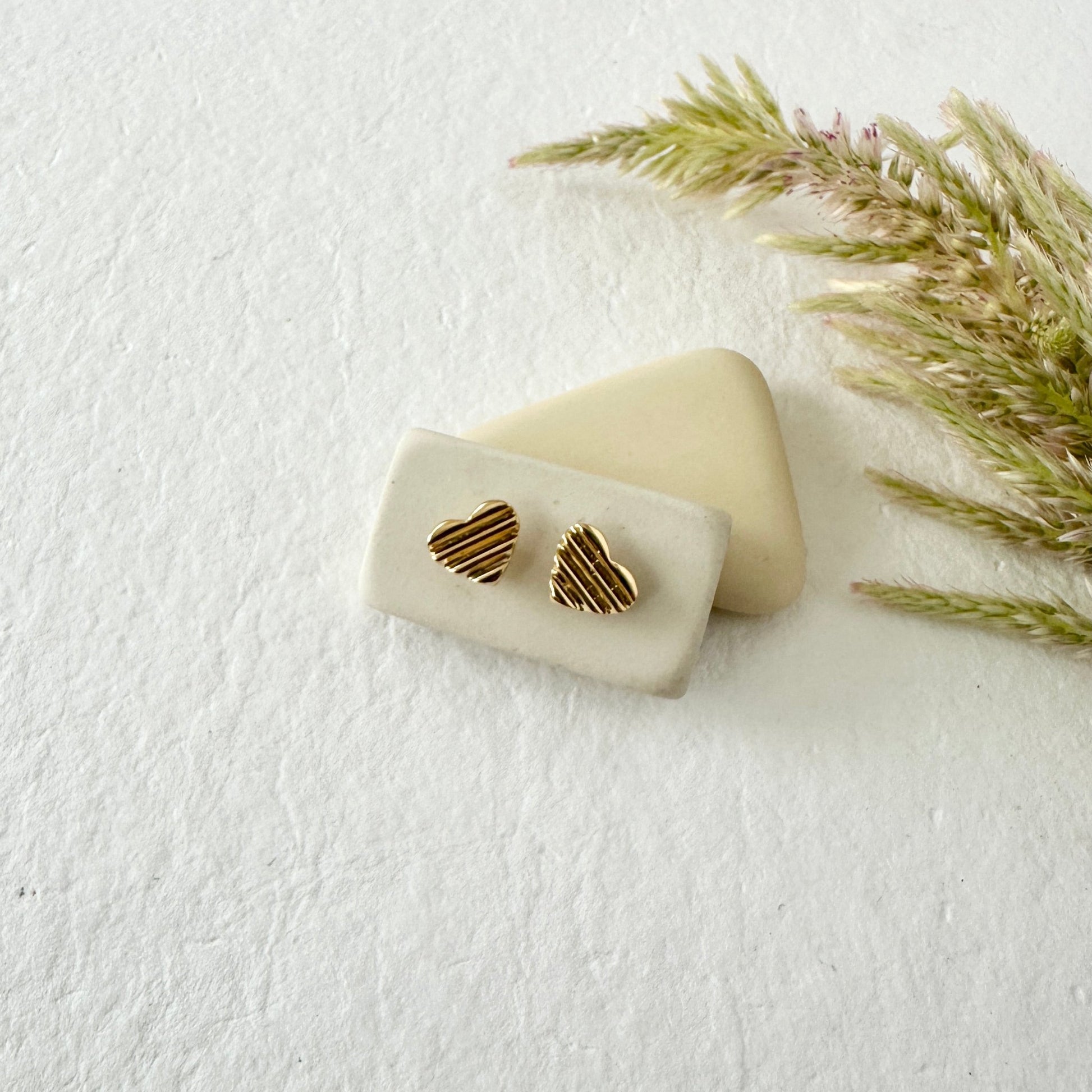 GOLD SCALA HEART STUDS - Sarah Cecelia Jewelry & Metal Goods