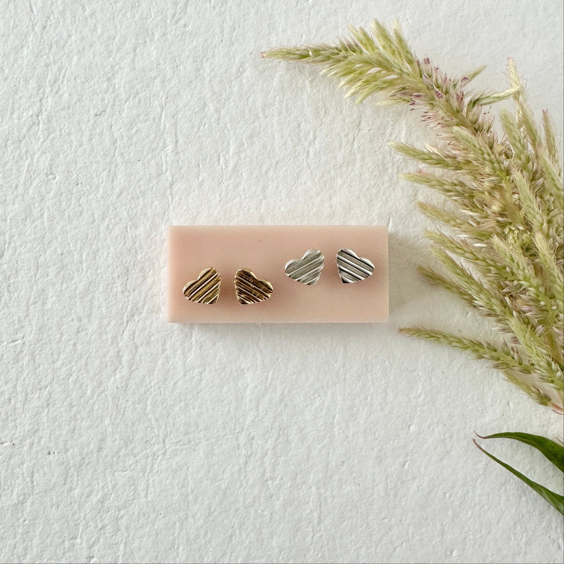 SILVER SCALA HEART STUDS - Sarah Cecelia Jewelry & Metal Goods