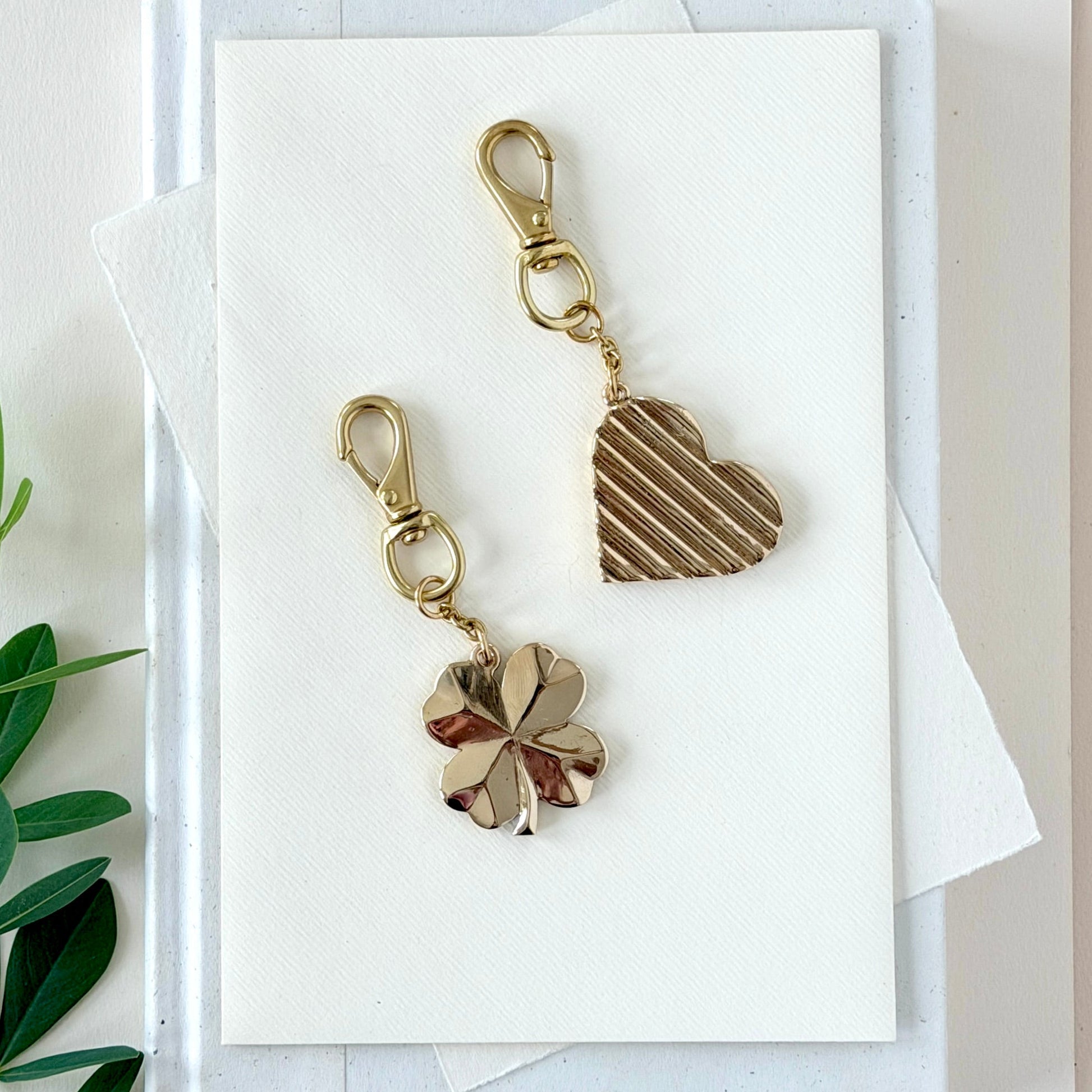 BRASS FOUR LEAF CLOVER BAG CHARM - Sarah Cecelia Jewelry & Metal Goods