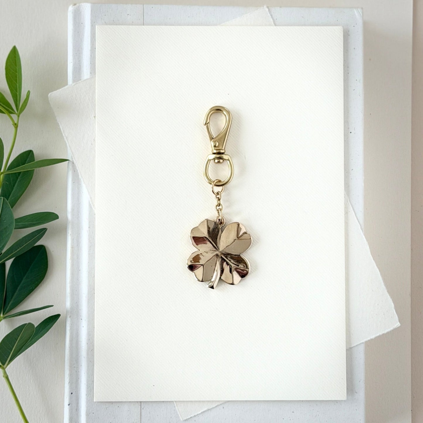 BRASS FOUR LEAF CLOVER BAG CHARM - Sarah Cecelia Jewelry & Metal Goods