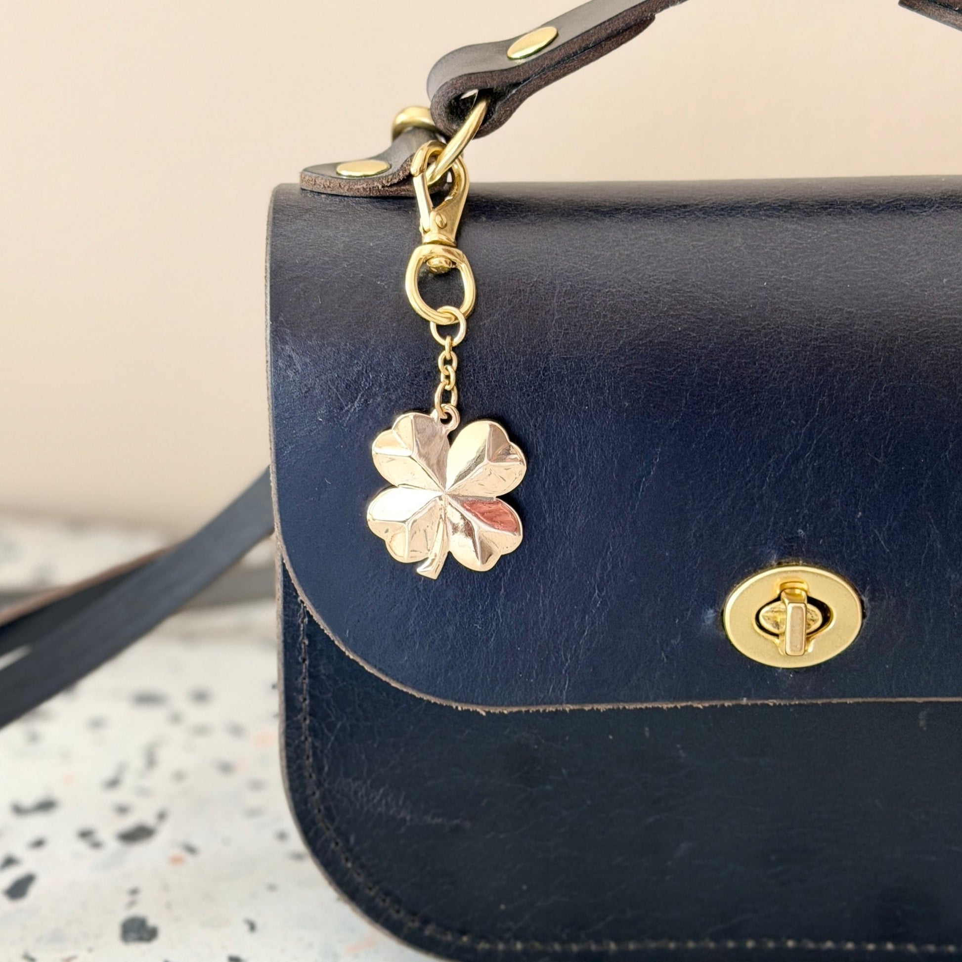 BRASS FOUR LEAF CLOVER BAG CHARM - Sarah Cecelia Jewelry & Metal Goods