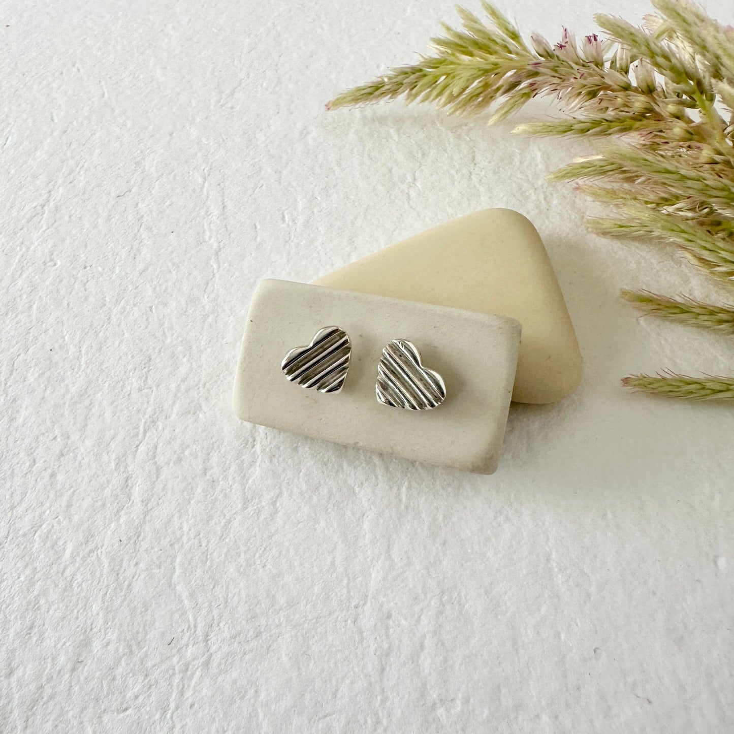 SILVER SCALA HEART STUDS - Sarah Cecelia Jewelry & Metal Goods
