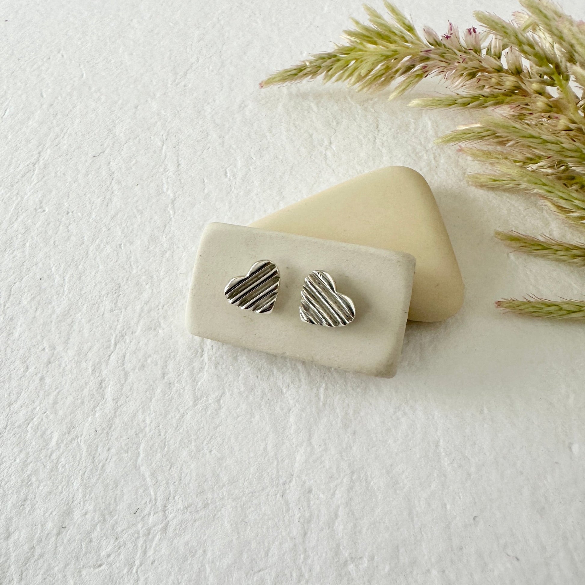 SILVER SCALA HEART STUDS - Sarah Cecelia Jewelry & Metal Goods