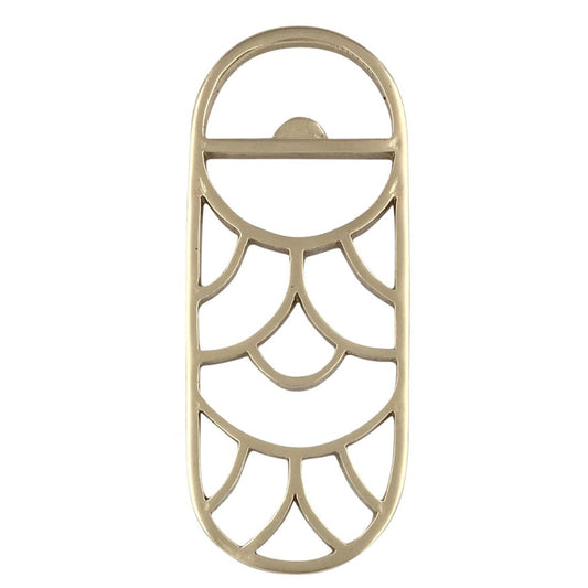 A handmade Art Deco inspired brass bottle opener on a white background 