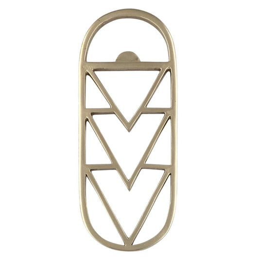 A Geometric brass bottle opener on a white background